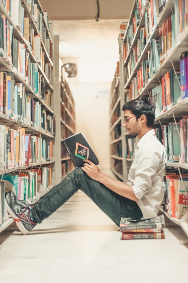 Student sitting at library